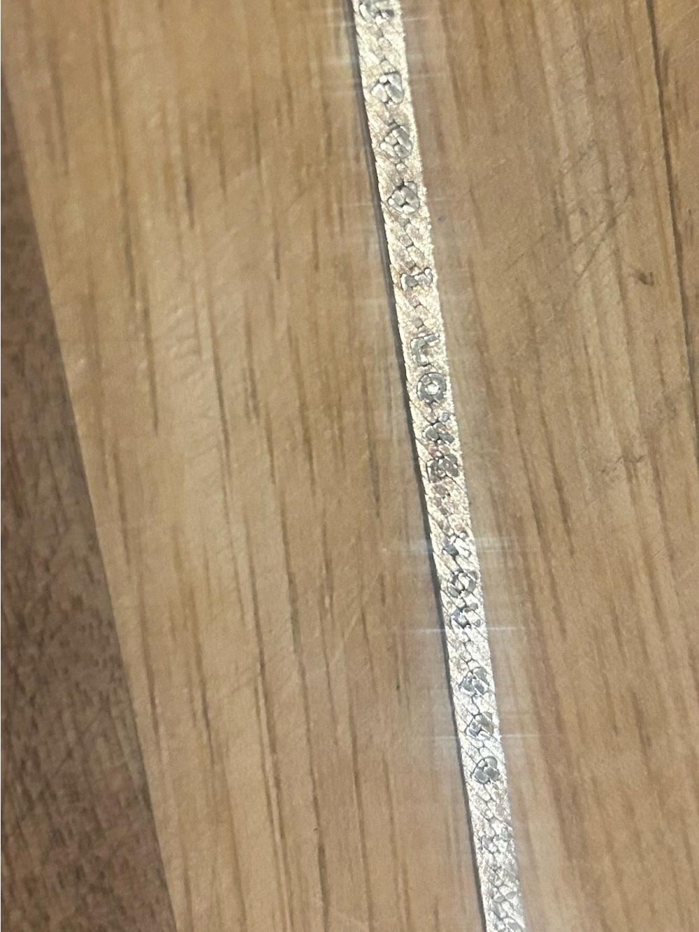 Sterling silver bracelet that says I love you herringbone